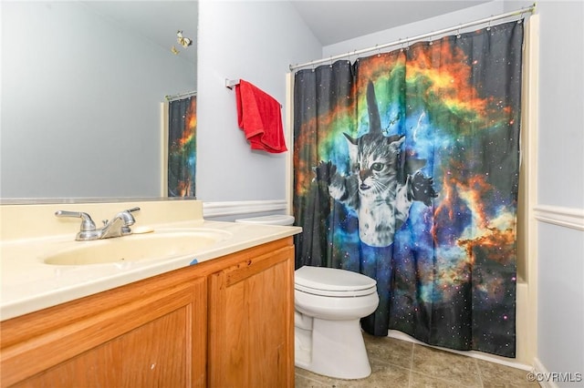 608 Southampton Dr, Ruther Glen, VA 22546 - full bathroom with vanity, toilet, tile patterned flooring, and a shower with shower curtain