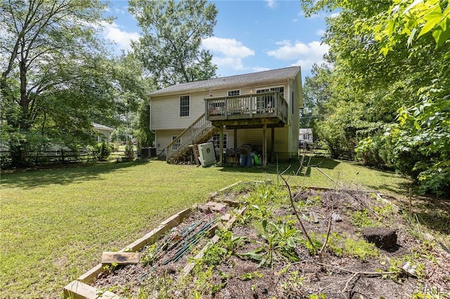 608 Southampton Dr, Ruther Glen, VA 22546 - back of property featuring stairway, a wooden deck, a garden, and cooling unit