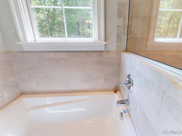 full bath featuring a bath