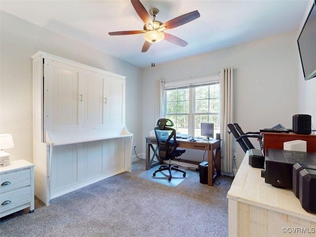 home office with carpet floors and ceiling fan