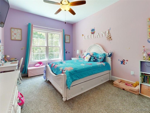 bedroom with ceiling fan and light carpet