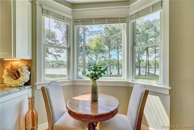 dining area with a water view