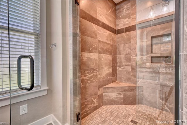 bathroom featuring a stall shower