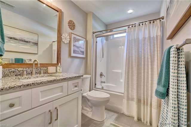 full bath with shower / bath combination with curtain, visible vents, vanity, tile patterned floors, and toilet