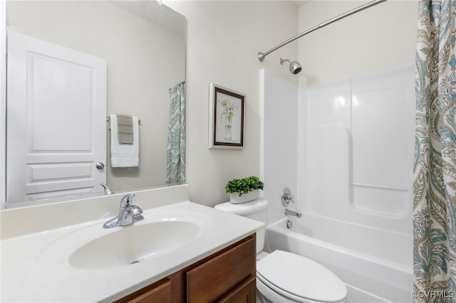 full bath featuring toilet, shower / bathtub combination with curtain, and vanity