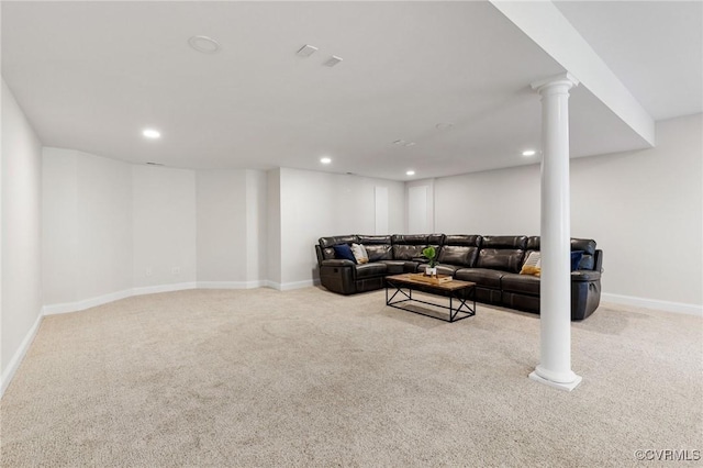 carpeted living room featuring baseboards and recessed lighting
