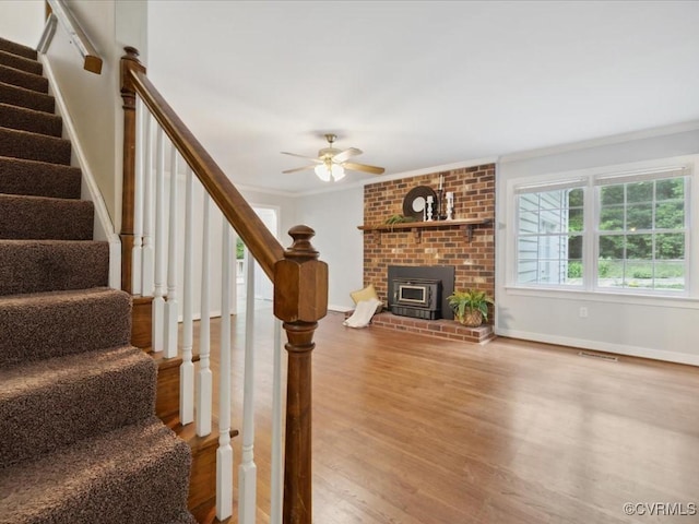 2004 Westwood Ct, Powhatan, VA 23139 - staircase with ornamental molding, a ceiling fan, wood finished floors, and baseboards