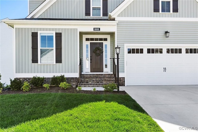10001 Craftsbury Dr, Midlothian, VA 22312 - view of front of house featuring driveway, a front lawn, an attached garage, and board and batten siding
