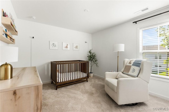 10001 Craftsbury Dr, Midlothian, VA 22312 - bedroom featuring light carpet, a crib, and baseboards