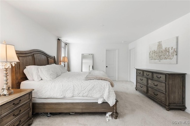 bedroom with light carpet