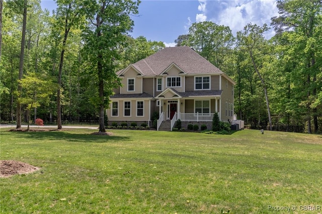 11264 Rivers Edge Ter, Gloucester, VA 23061 - view of front of home with roof with shingles, covered porch, and a front lawn