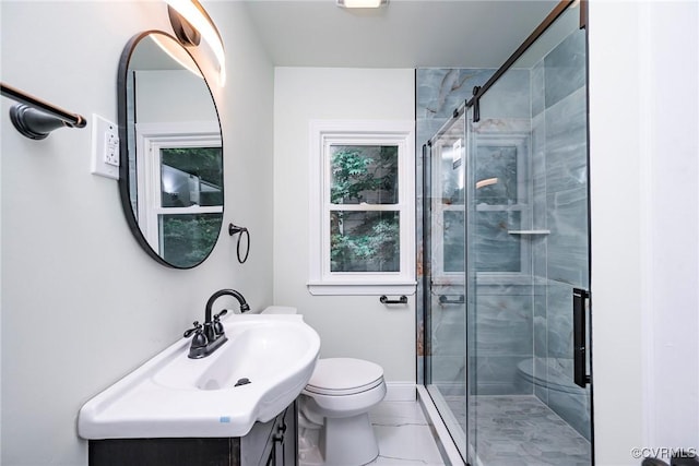 512 Pollock St, Richmond, VA 23222 - full bath with vanity, baseboards, a shower stall, and toilet