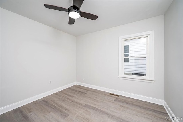 512 Pollock St, Richmond, VA 23222 - spare room with visible vents, a ceiling fan, baseboards, and wood finished floors