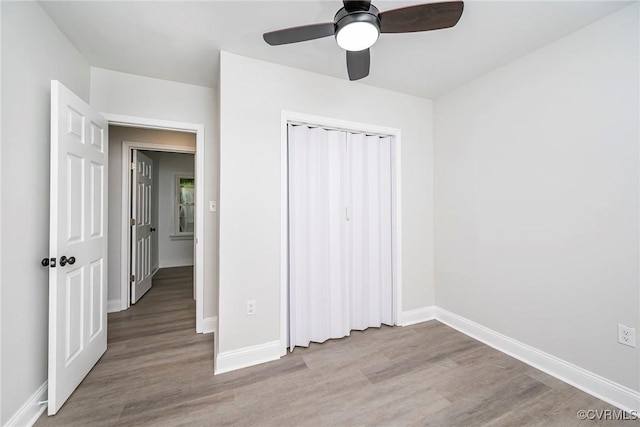 512 Pollock St, Richmond, VA 23222 - unfurnished bedroom featuring baseboards, wood finished floors, and a closet