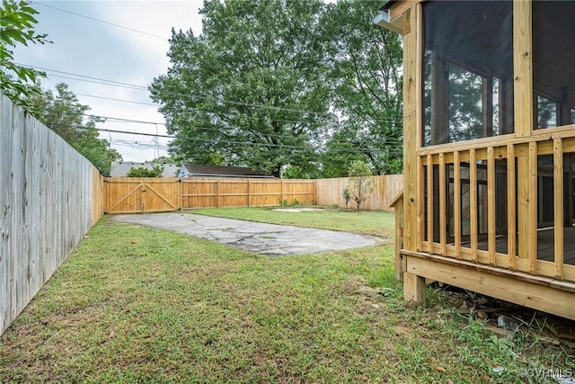 512 Pollock St, Richmond, VA 23222 - view of yard with a gate, a fenced backyard, and a wooden deck