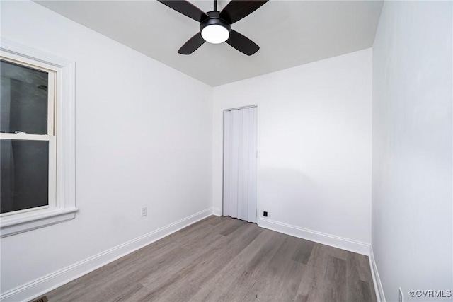 512 Pollock St, Richmond, VA 23222 - empty room with a ceiling fan, baseboards, and wood finished floors