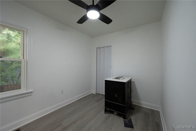 512 Pollock St, Richmond, VA 23222 - unfurnished bedroom featuring baseboards, ceiling fan, wood finished floors, and a closet