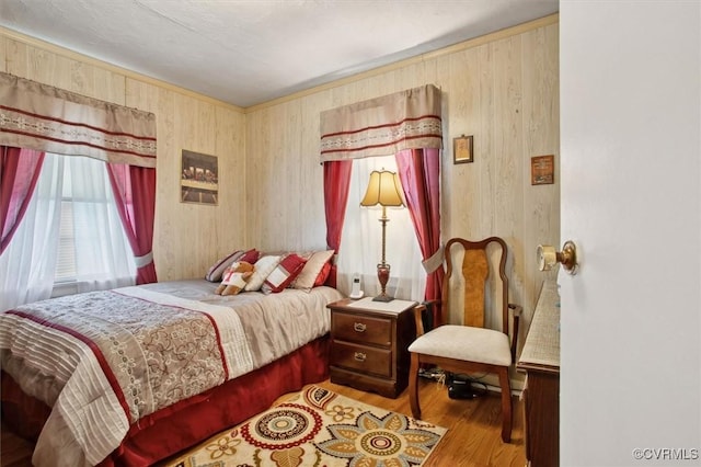 6266 Richmond Rd, Williamsburg, VA 23188 - bedroom with wooden walls and wood finished floors