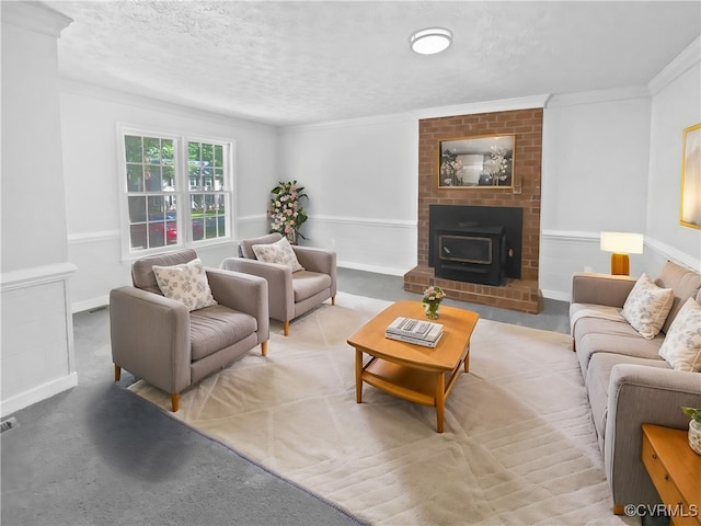 10901 Drayton Rd, Chester, VA 23831 - living room featuring a textured ceiling, carpet, ornamental molding, and a wood stove