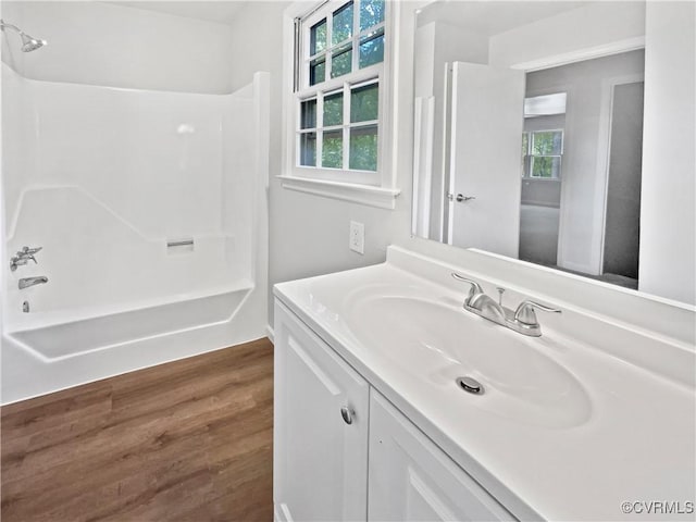 10901 Drayton Rd, Chester, VA 23831 - full bathroom featuring vanity, shower / bathtub combination, and wood finished floors
