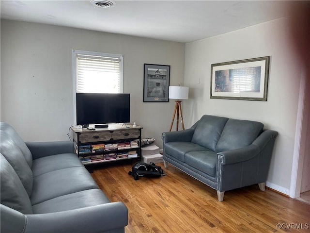 living area featuring wood finished floors