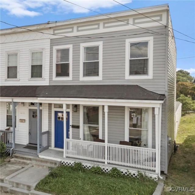 view of property with covered porch
