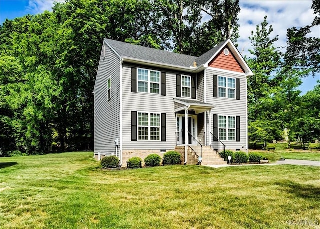 view of front of house featuring a front lawn and crawl space