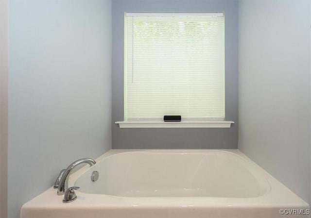 full bathroom with a garden tub