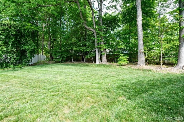 view of yard with fence