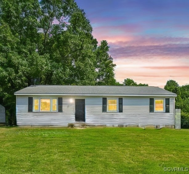ranch-style home with crawl space and a front yard
