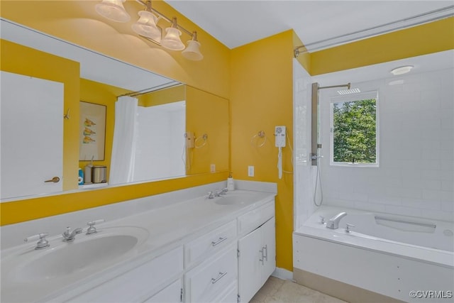 2215 Ditchley Rd, Kilmarnock, VA 22482 - bathroom with double vanity, washtub / shower combination, and tile patterned flooring