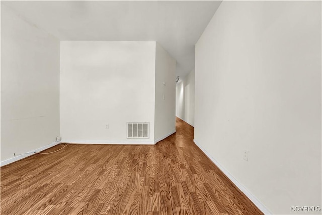 2111 Maplewood Ave, Richmond, VA 23220 - additional living space featuring visible vents, baseboards, and wood finished floors