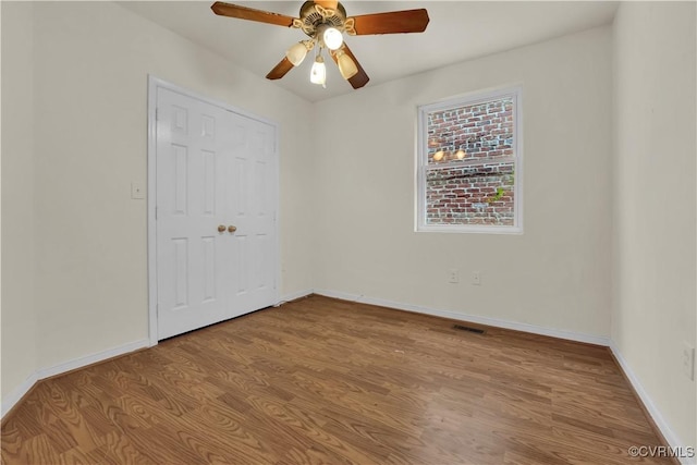 2111 Maplewood Ave, Richmond, VA 23220 - unfurnished bedroom with visible vents, baseboards, and wood finished floors