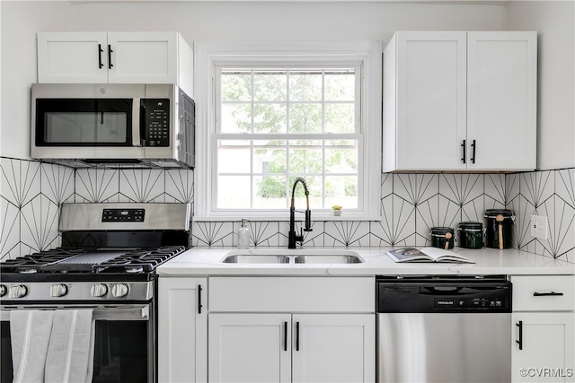 507 Patrick Ave, Richmond, VA 23222 - kitchen featuring stainless steel appliances, decorative backsplash, plenty of natural light, and light countertops
