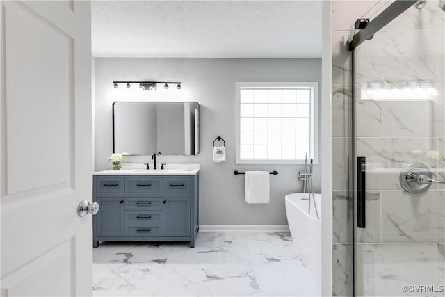 7713 Flag Tail Dr, Midlothian, VA 23112 - full bath with a marble finish shower, marble look tile flooring, vanity, a soaking tub, and baseboards