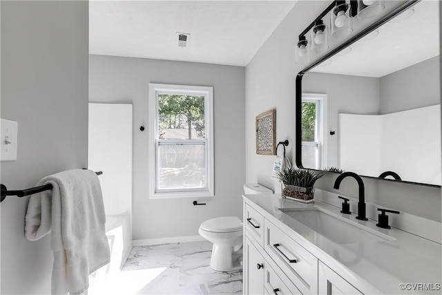 7713 Flag Tail Dr, Midlothian, VA 23112 - full bathroom featuring vanity, plenty of natural light, toilet, and marble finish floors