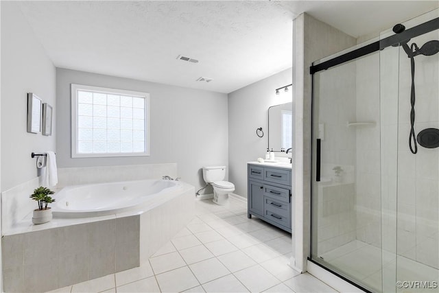 7713 Flag Tail Dr, Midlothian, VA 23112 - bathroom featuring vanity, a garden tub, a stall shower, toilet, and tile patterned flooring