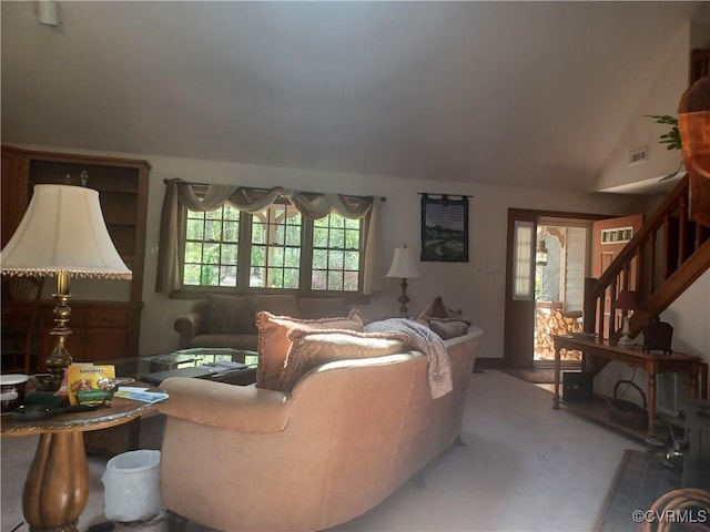 1720 Linda Carol Dr, Powhatan, VA 23139 - carpeted living area featuring stairway, visible vents, and lofted ceiling