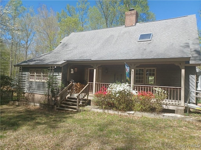 1720 Linda Carol Dr, Powhatan, VA 23139 - view of front facade with a porch, a front yard, a chimney, and roof with shingles