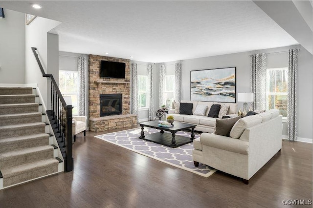 1 Abercrombie Dr, Chesterfield, VA 23838 - living room with dark wood finished floors, stairway, a stone fireplace, recessed lighting, and baseboards