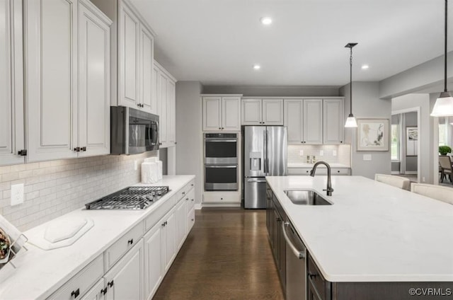 1 Abercrombie Dr, Chesterfield, VA 23838 - kitchen featuring stainless steel appliances, a sink, backsplash, recessed lighting, and a kitchen island with sink