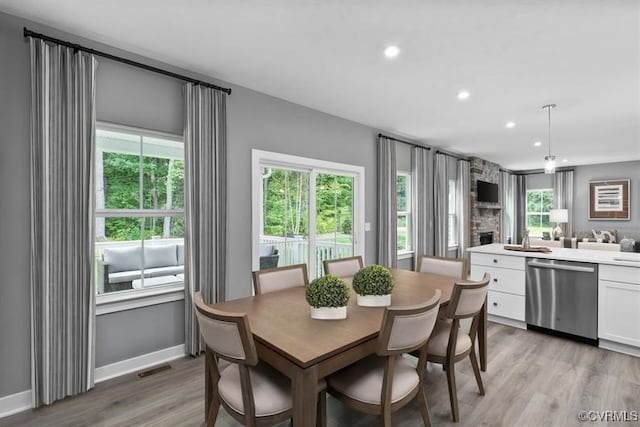 6 Abercrombie Dr, Chesterfield, VA 23838 - dining room with light wood-style flooring, recessed lighting, baseboards, and a fireplace