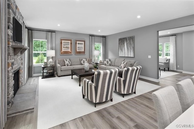 6 Abercrombie Dr, Chesterfield, VA 23838 - living room with light wood-style floors, recessed lighting, a fireplace, and baseboards