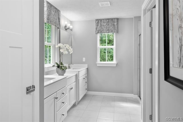 6 Abercrombie Dr, Chesterfield, VA 23838 - full bath with double vanity, tile patterned floors, and baseboards
