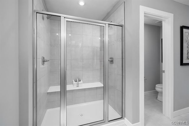 6 Abercrombie Dr, Chesterfield, VA 23838 - bathroom featuring toilet, a stall shower, and baseboards