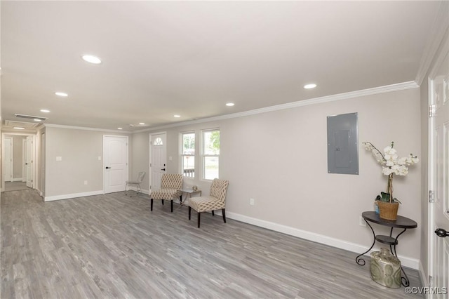 1701 Arlington Rd, Hopewell, VA 23860 - sitting room with crown molding, baseboards, wood finished floors, and electric panel
