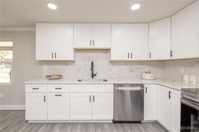 1701 Arlington Rd, Hopewell, VA 23860 - kitchen featuring crown molding, light stone countertops, a sink, stainless steel appliances, and decorative backsplash