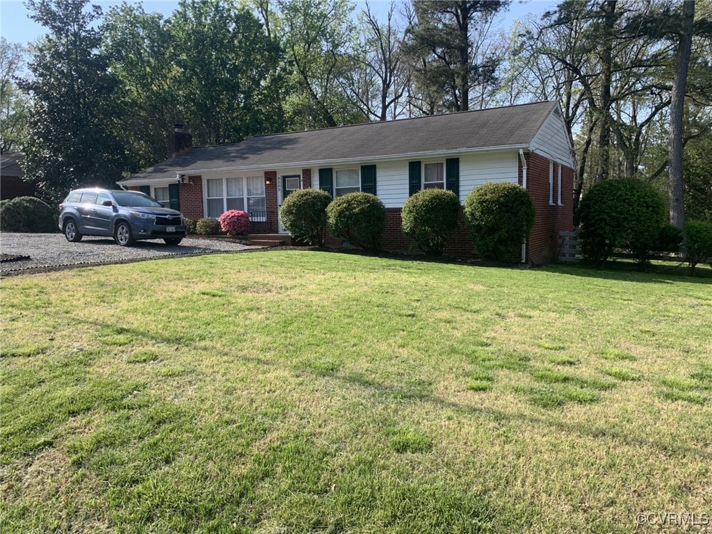 9503 Bonnie Dale Rd, Henrico, VA 23229 - single story home featuring brick siding and a front lawn