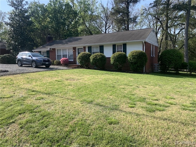 9503 Bonnie Dale Rd, Henrico, VA 23229 - single story home featuring brick siding and a front lawn