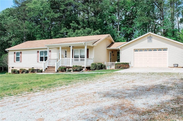 view of front of home with a front lawn, an attached garage, roof with shingles, a porch, and driveway